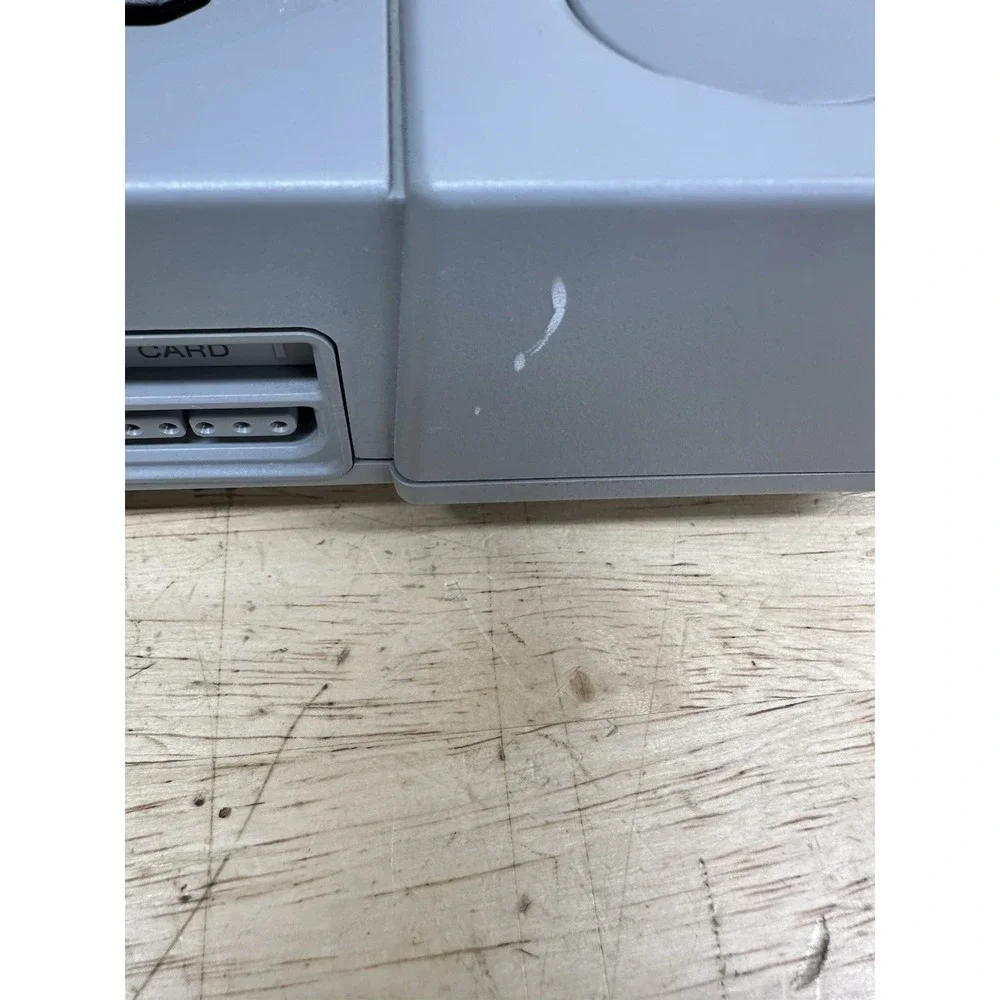 Sony PlayStation Console with DualShock Controllers Cables 4 Games SCPH-7501